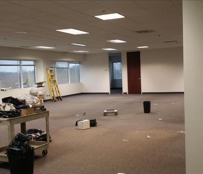 This is the same office, a few weeks later, with the desk and cubicles gone. 